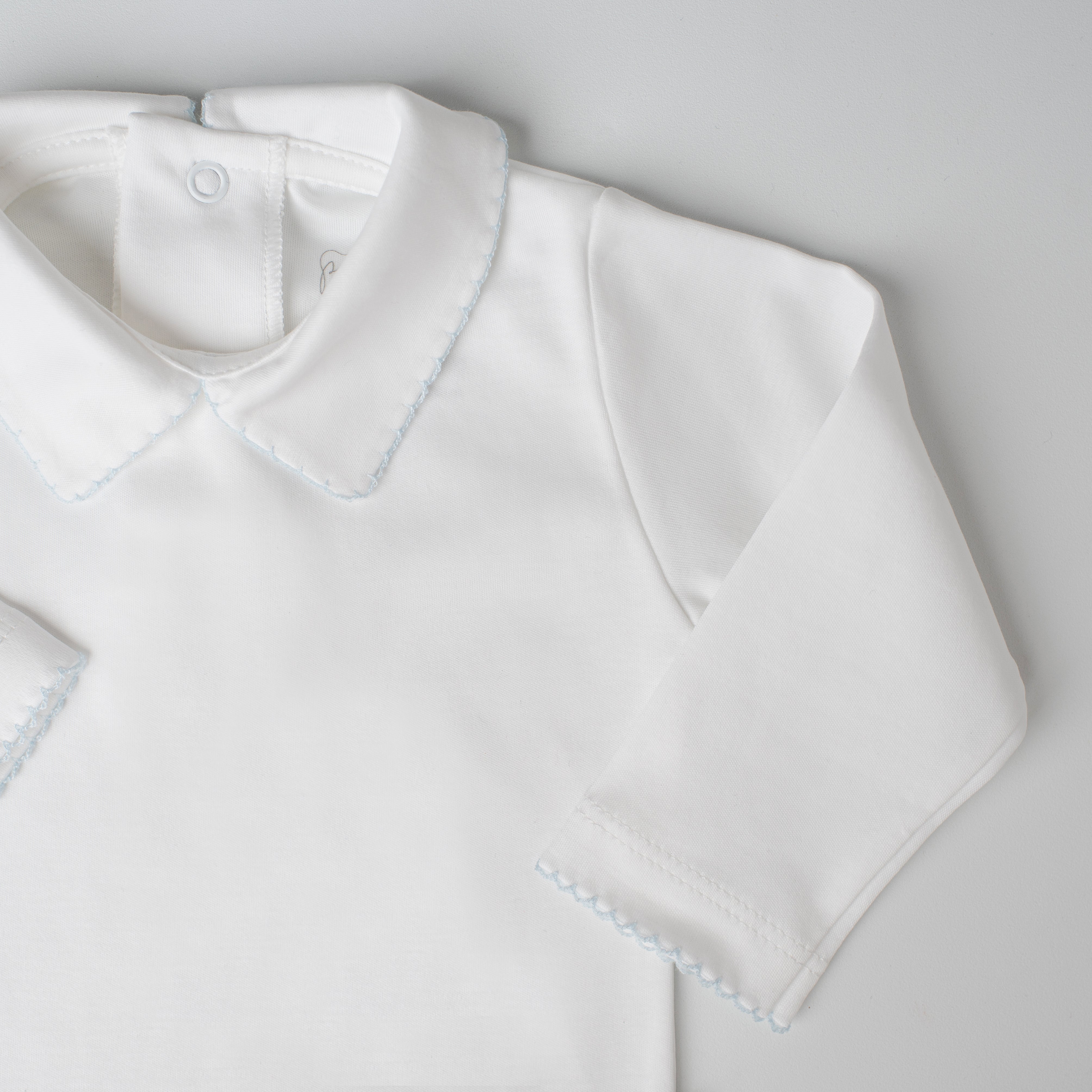 Body Quero-Quero Manga Longa Branco Detalhe Azul