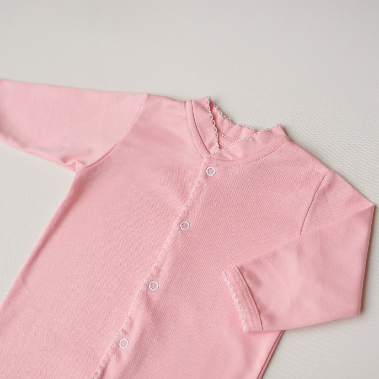 Macacão Arara Rosa