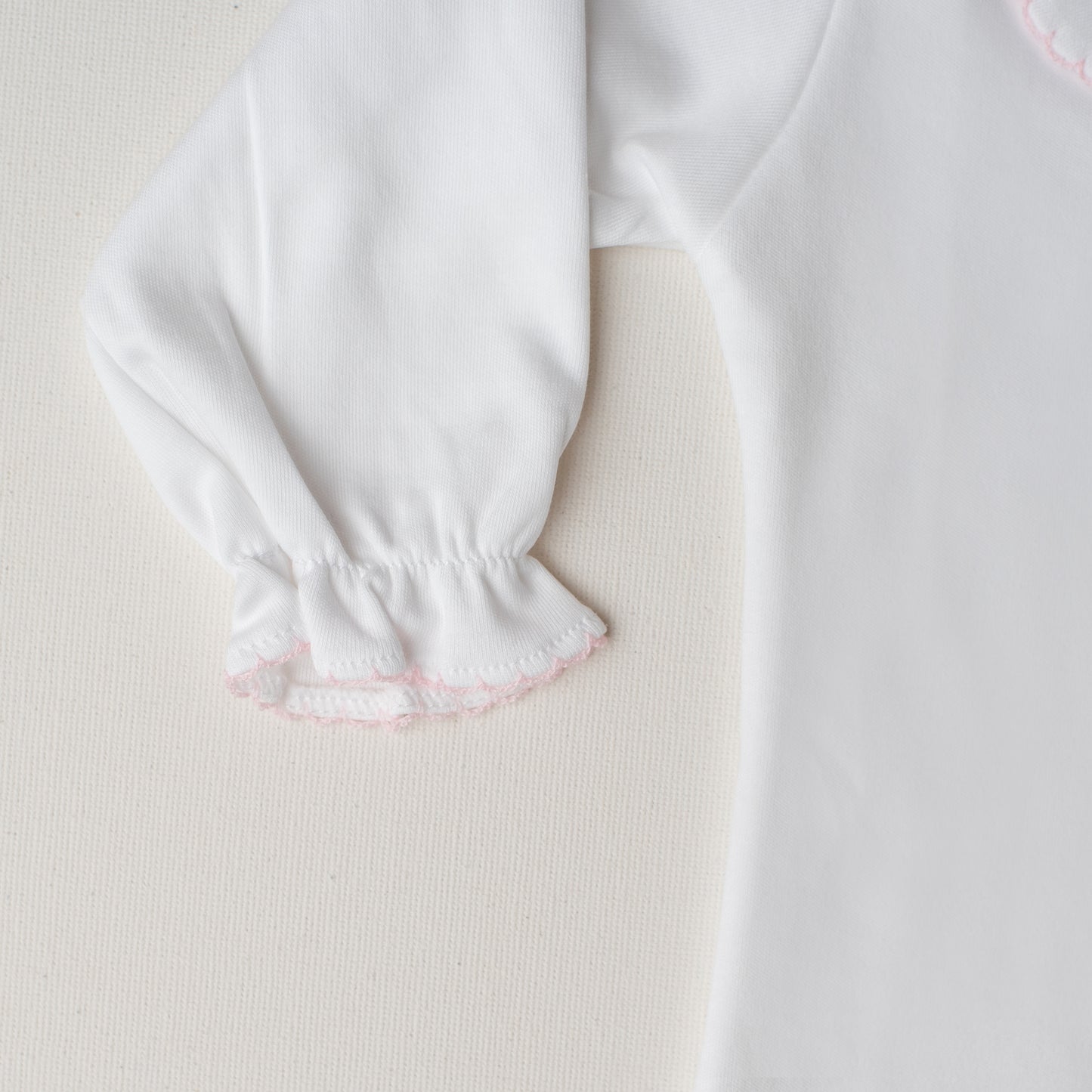 Body Garça Manga Longa Detalhe Rosa Claro