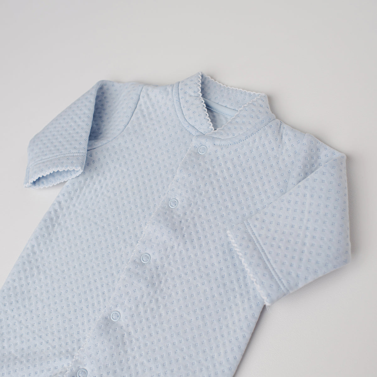Macacão Arara Jacquard Azul
