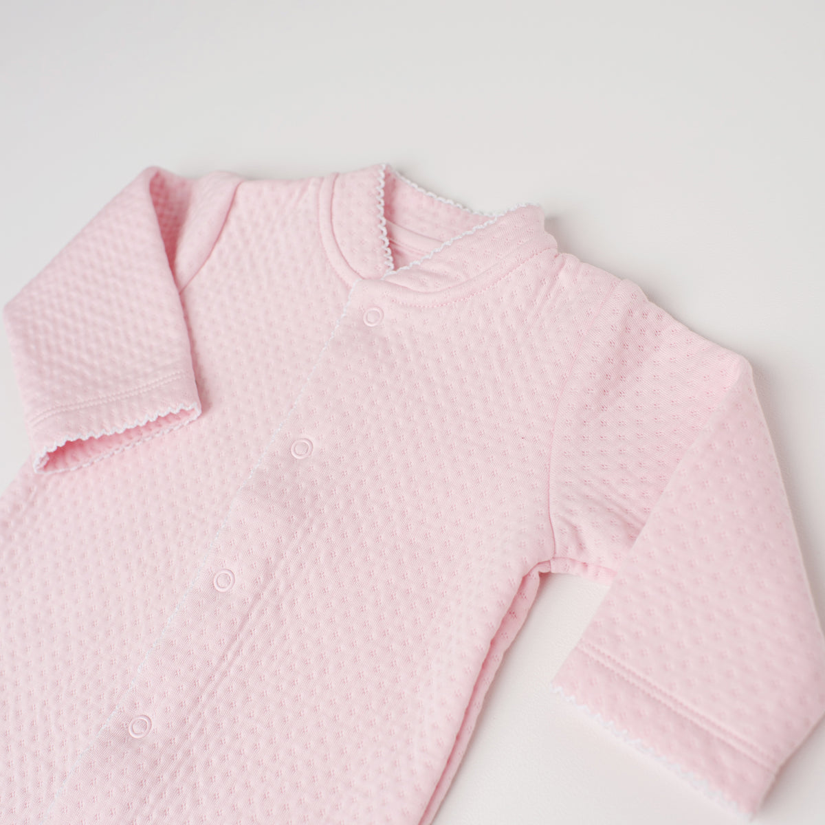 Macacão Arara Jacquard Rosa