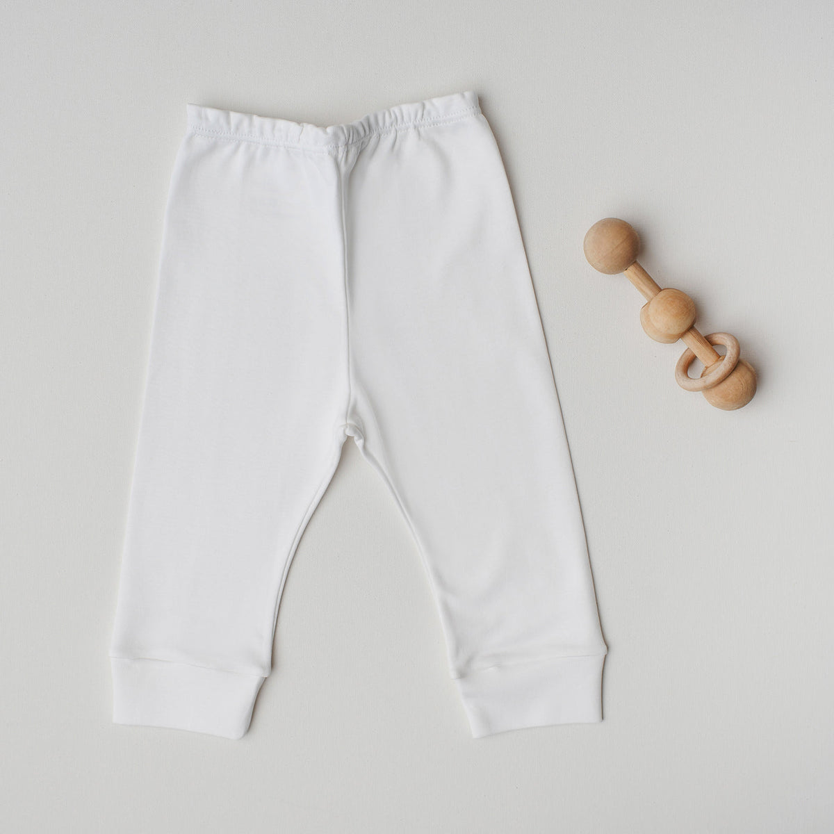 Kit 3 calças sem pezinho brancas e rosa claro em algodão pima peruano para bebê passalinho – calça branca