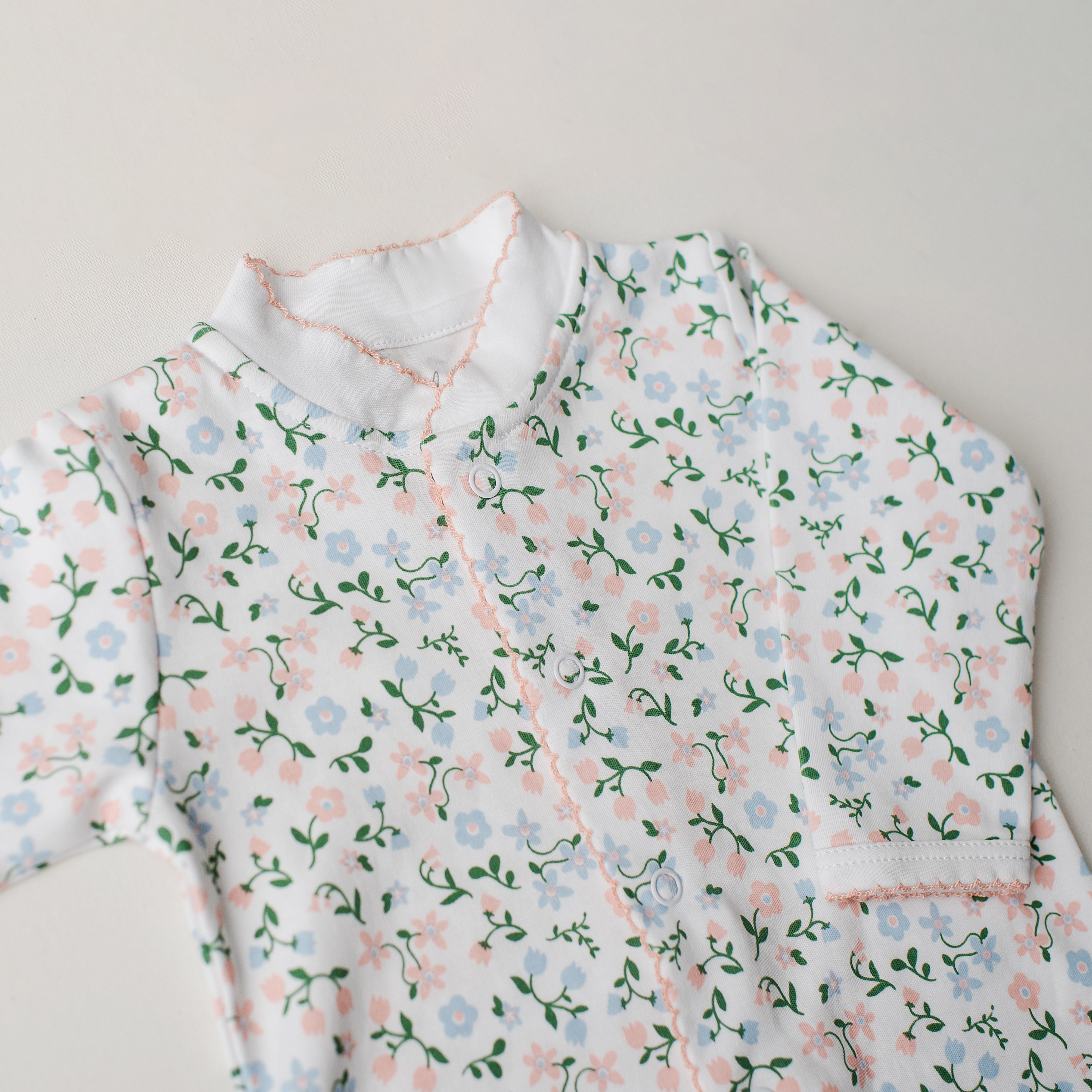 Macacão Arara Flores