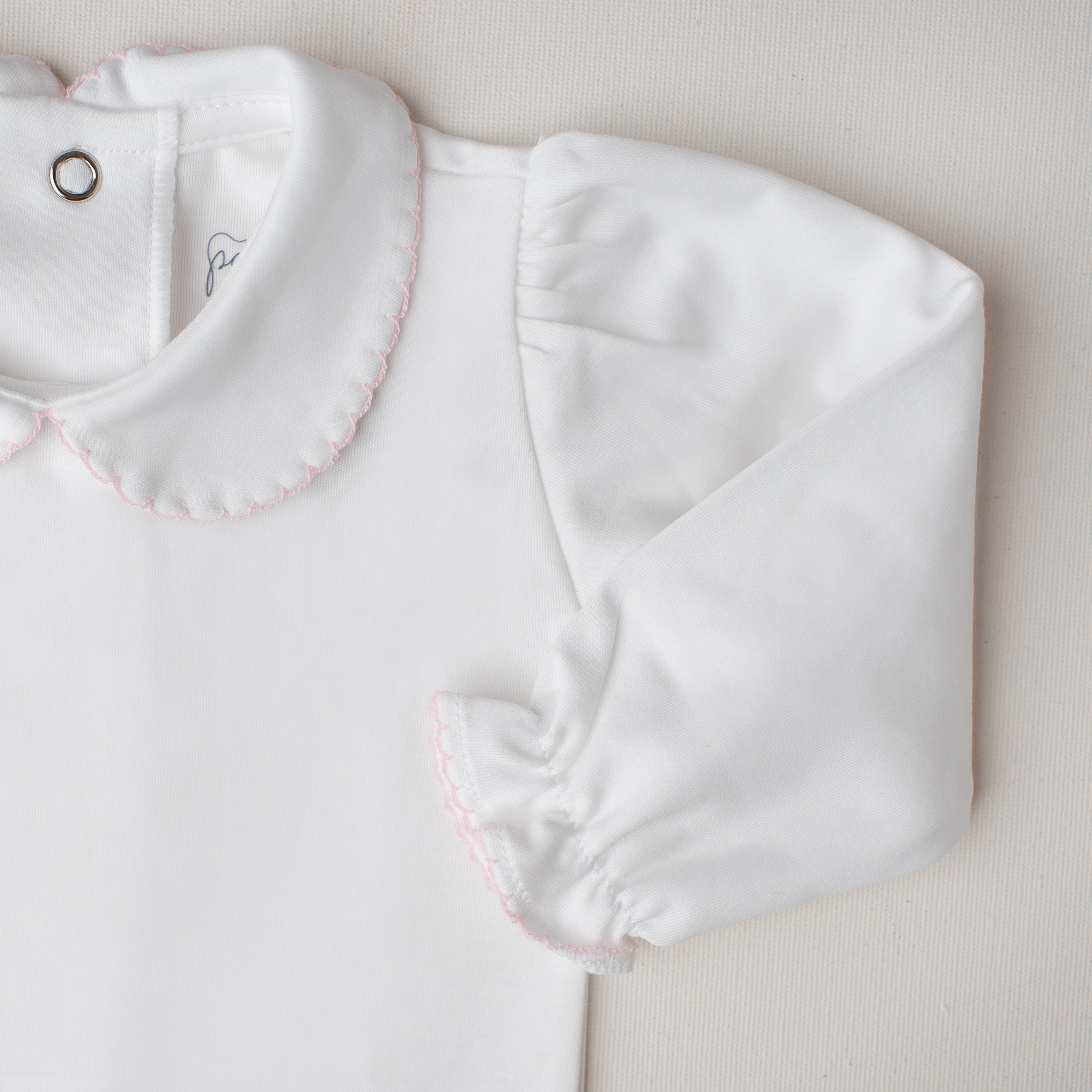 Body Garça Manga Longa Detalhe Rosa Claro