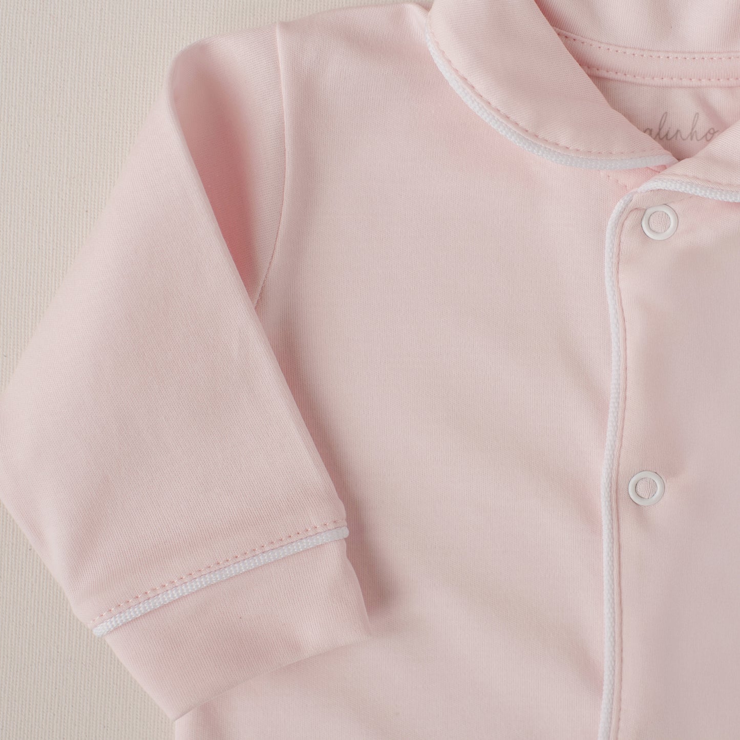 Macacão Tucano Rosa Claro