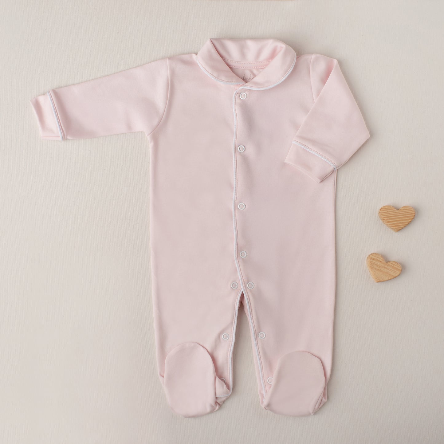 Macacão Tucano Rosa Claro