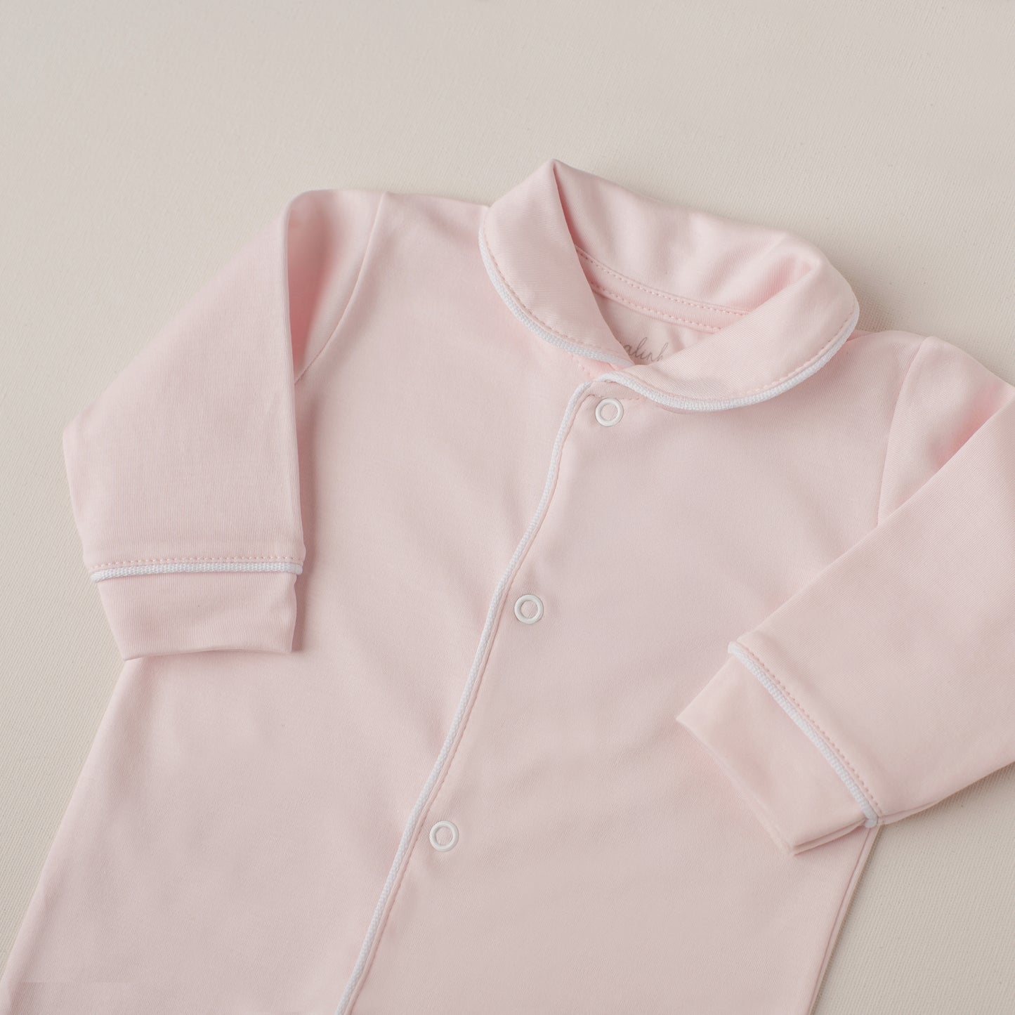 Macacão Tucano Rosa Claro