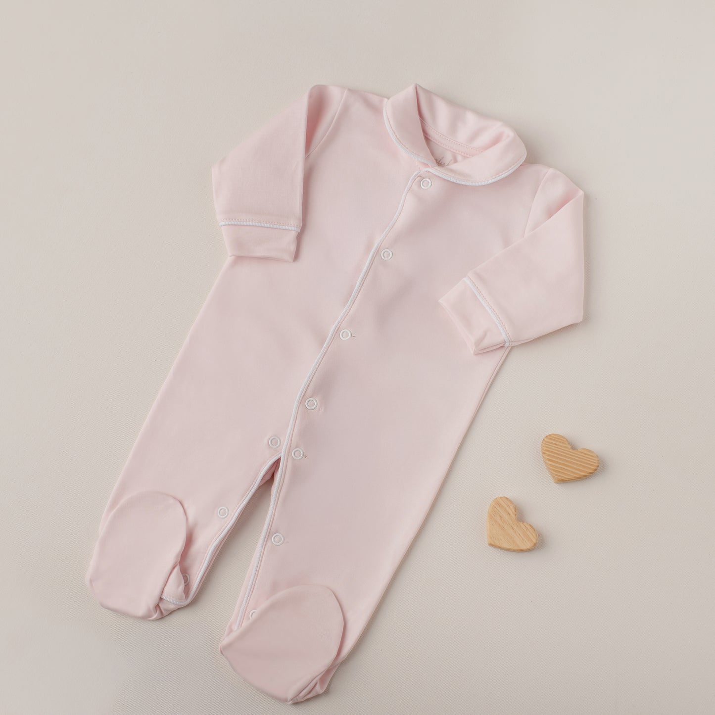 Macacão Tucano Rosa Claro