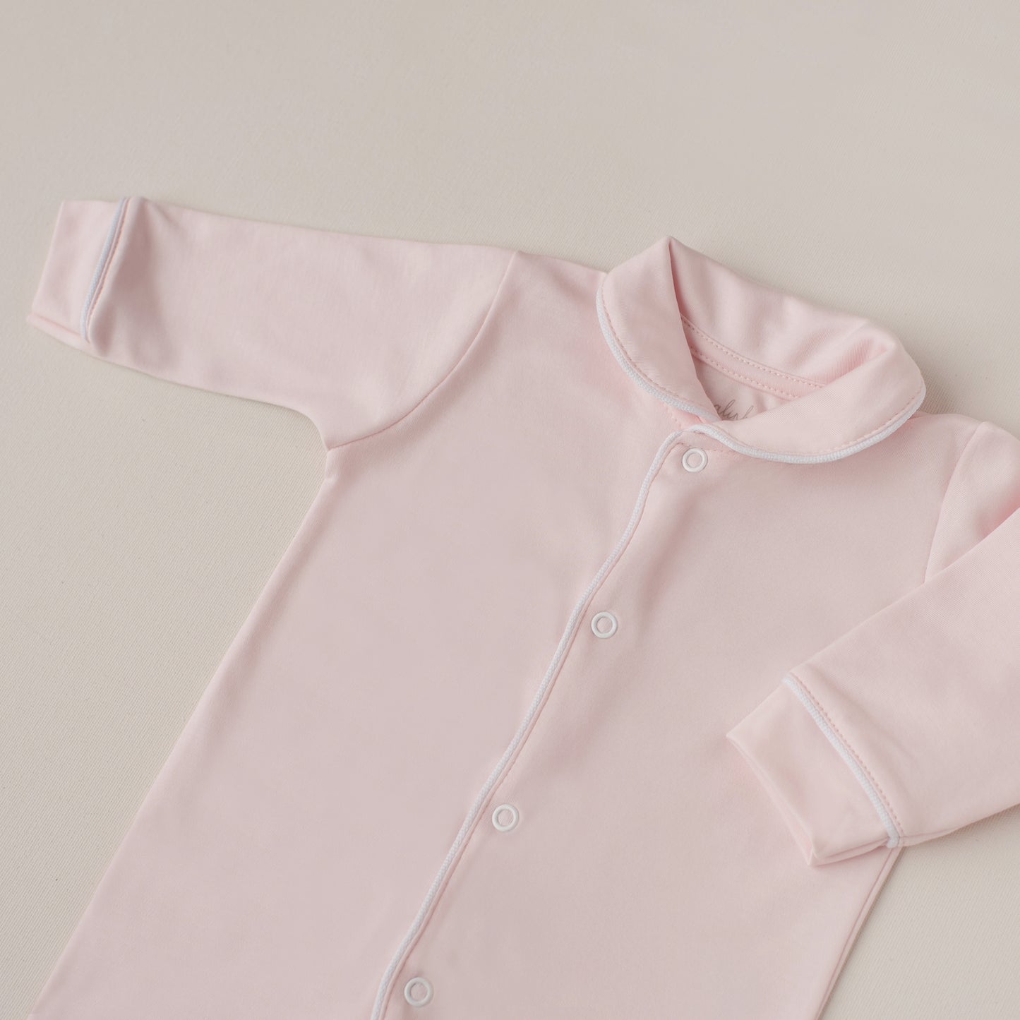 Macacão Tucano Rosa Claro